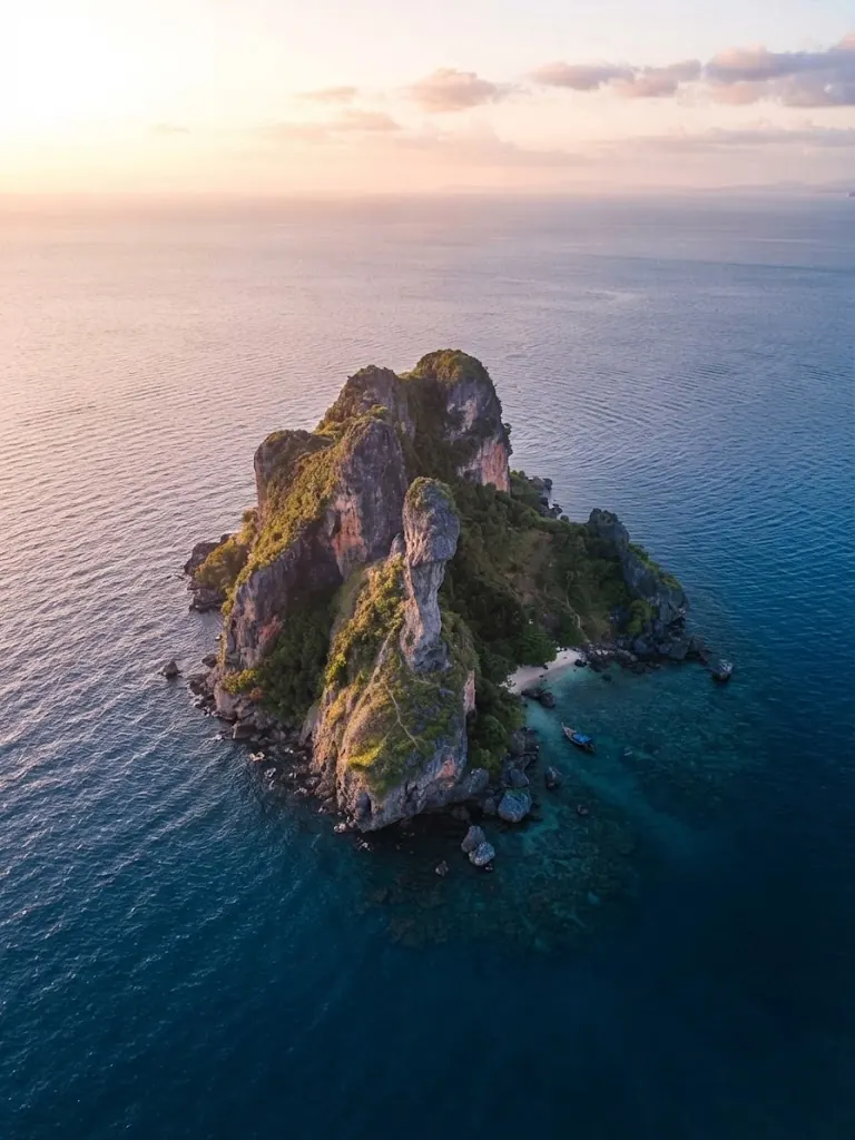 Top-down aerial view of Chicken Island surrounded by deep blue water